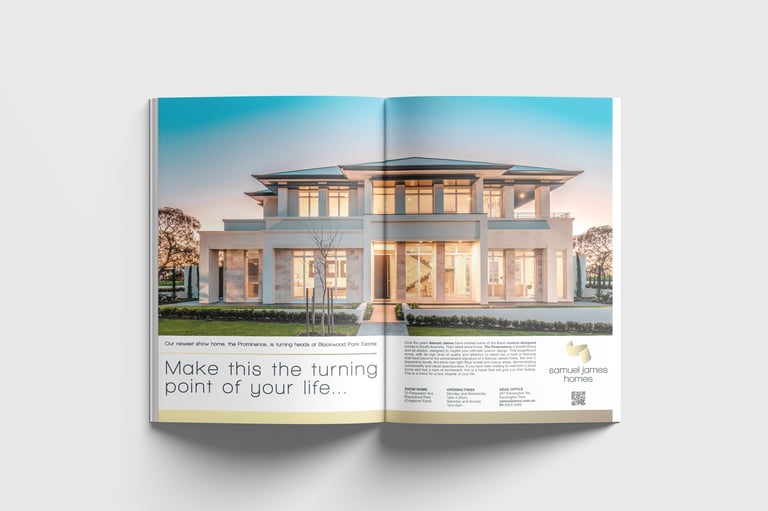Open real estate brochure displaying luxury home with tagline Make this the turning point of your life