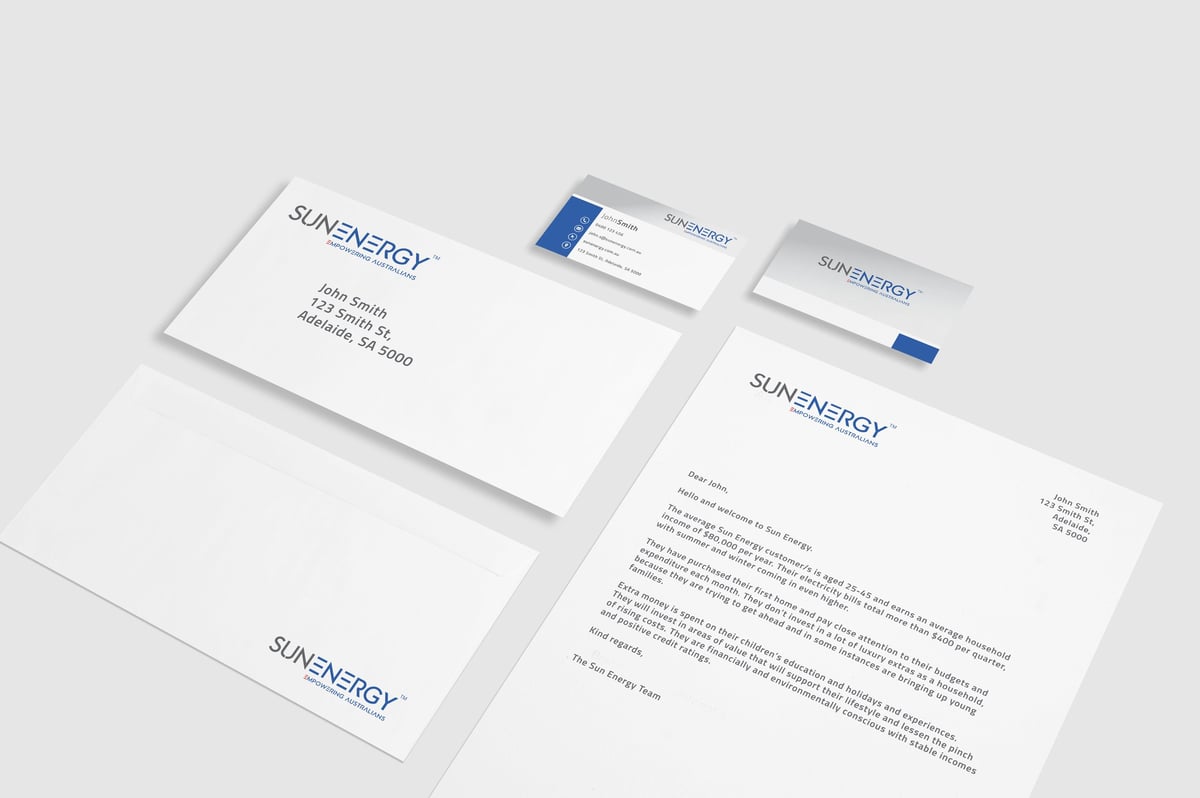Sunsynergy branding stationery set including business cards, envelopes, and letterhead displayed on white background